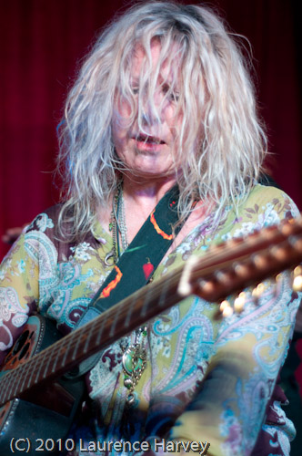 Catherine 'Been' Feeney on acoustic guitar