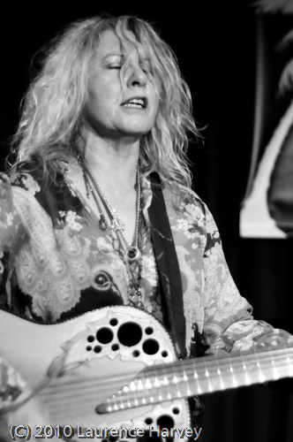 Catherine 'Been' Feeney on acoustic guitar