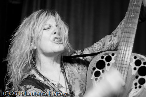 Catherine 'Been' Feeney on acoustic guitar
