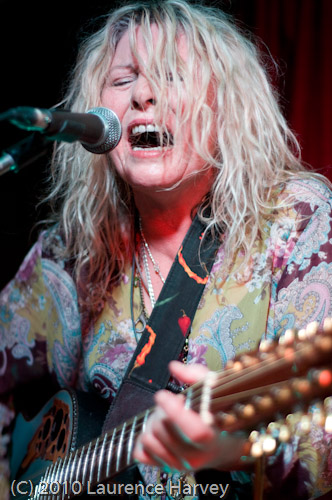 Catherine 'Been' Feeney on acoustic guitar