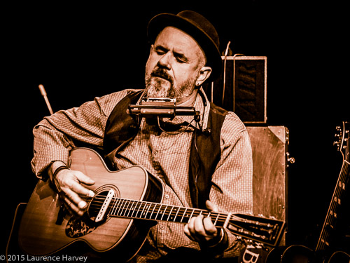 Trevor Steger on acoustic guitar and harmonica