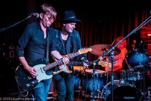 Dave Hanson & Martyn Goddard duelling on guitars, Dan Woodward on drums