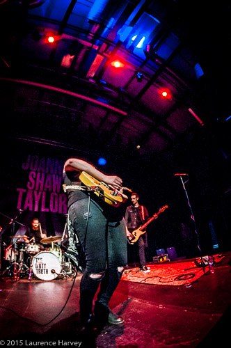 Joanne Shaw Taylor & her band on stage at Arlington Arts Centre