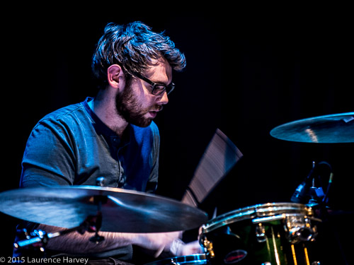 Sam Edwards on drums