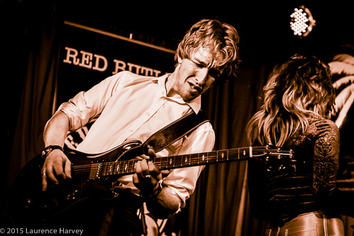 Alex Butler on guitar and backing vocals