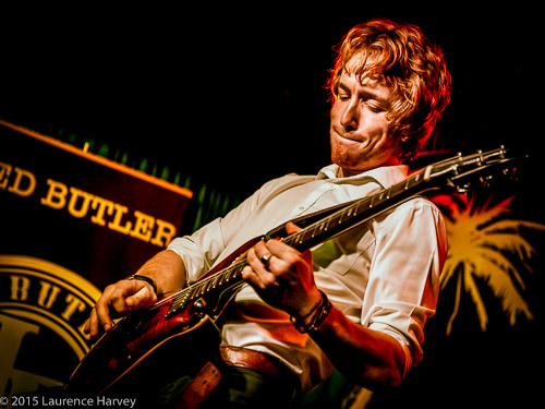 Alex Butler on guitar and backing vocals