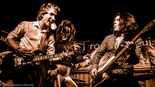 Alex Butler on guitar, Jane Pearce on vocals & Mike Topp on bass