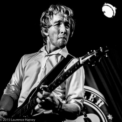 Alex Butler on guitar and backing vocals