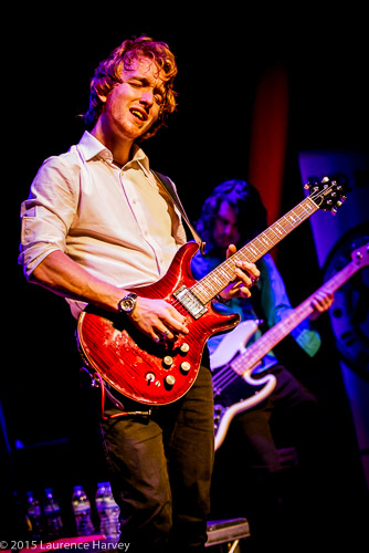 Alex Butler on guitar and backing vocals