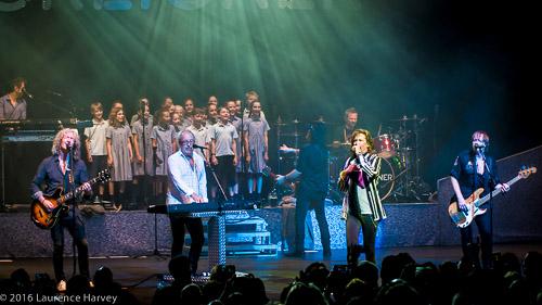 Foreigner and children's choir on stage at The London Palladium