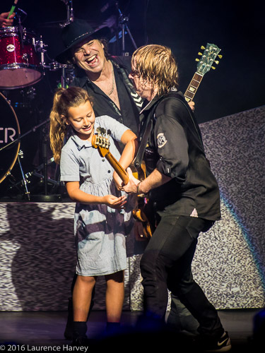 Jeff Pilson & Tom Gimbel with one of the girls from the children's choir