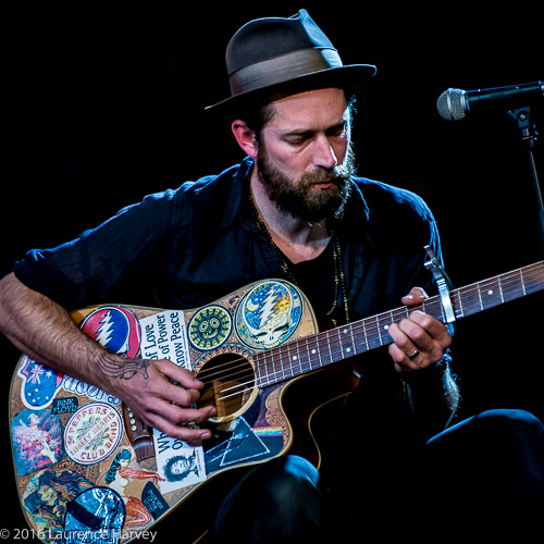 Luke Bourne on acoustic guitar