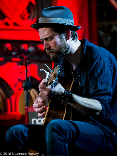 Luke Bourne on acoustic guitar