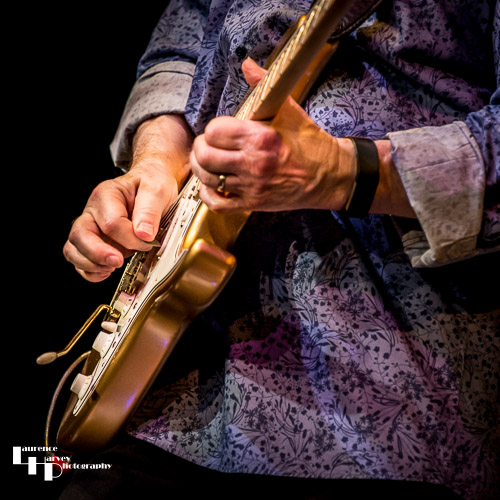 Close-up of John Verity's guitar action