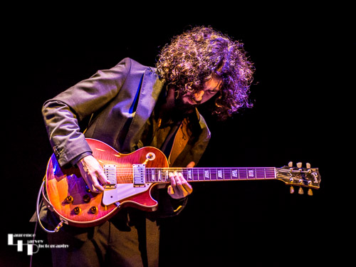 Kid Carlos on guitar