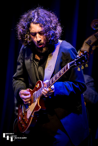 Kid Carlos on guitar