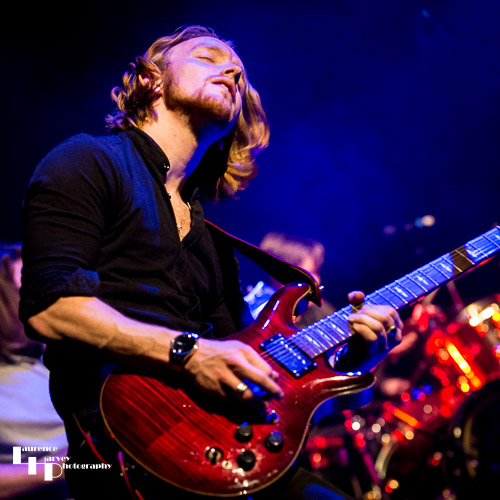 Alex Butler on lead guitar and backing vocals