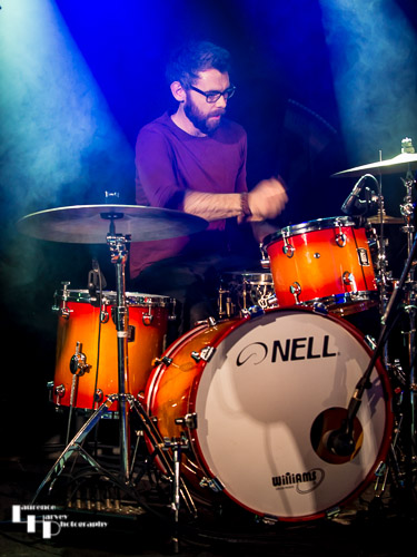Sam Edwards on drums