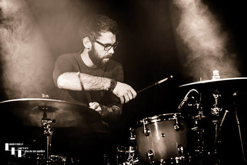 Sam Edwards on drums
