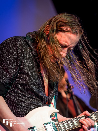 Innes Sibun on guitar