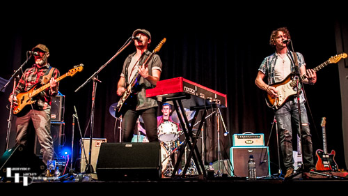Greg Coulson & his band on stage at The Corn Hall