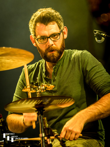 Sam Edwards on drums