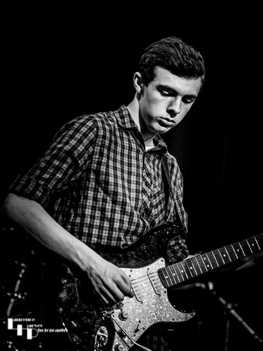 Cameron Evans on guitar