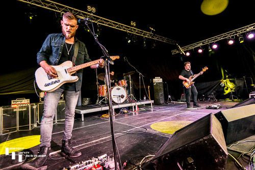 Ben Poole & his band on stage at Cambridge Rock Festival