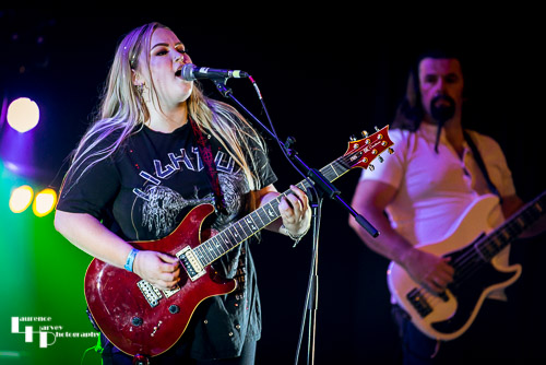 Tori Mai on rhythm guitar & vocals