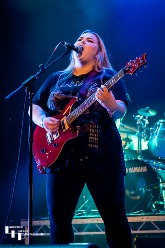Tori Mai on rhythm guitar & vocals