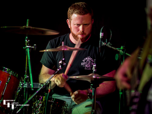 Aaron Oakley on drums