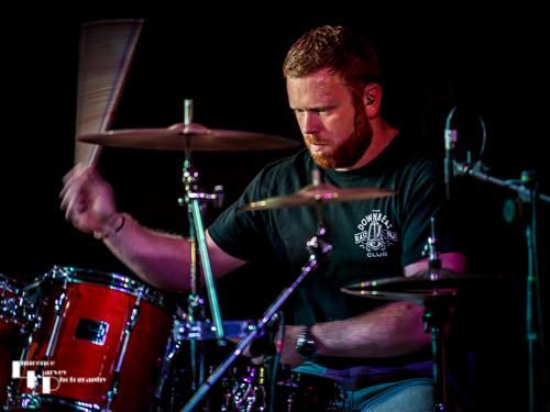 Aaron Oakley on drums