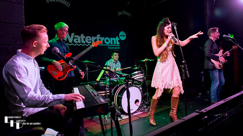 Ron Sayer, Charlotte Joyce & their band on stage at The Waterfront