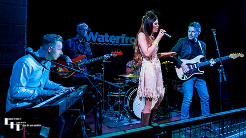 Ron Sayer, Charlotte Joyce & their band on stage at The Waterfront