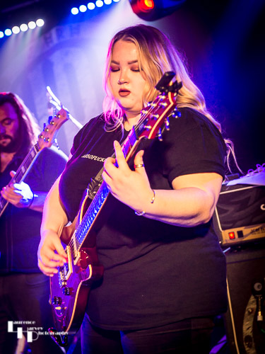 Tori Mai on rhythm guitar & vocals