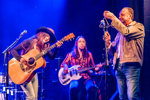 Arielle on vocals & guitar, Devin North on bass & volunteer punter (Glen) on triangle