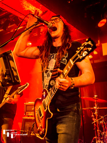 Charlie McCarthy on vocals & rhythm guitar