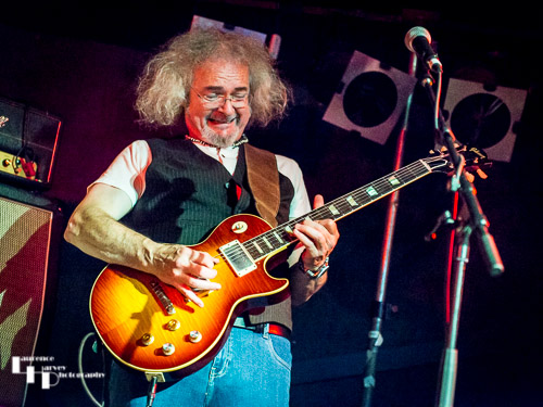 Toby Jones on guitar