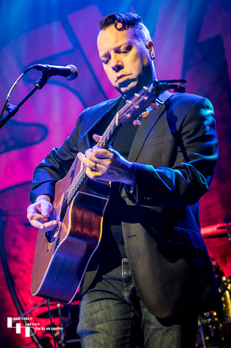 Jim Kirkpatrick on acoustic guitar