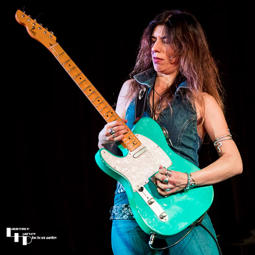 Susan Santos on guitar & vocals
