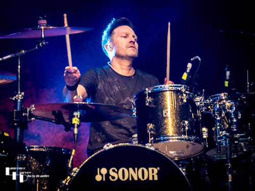 Adam Booth on drums