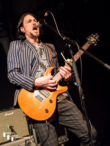 Aaron Bond on guitar & vocals