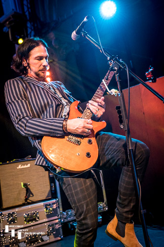 Aaron Bond on guitar & vocals