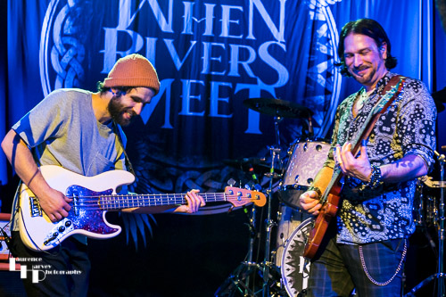 Aaron Bond on guitar, Adam Bowers on bass