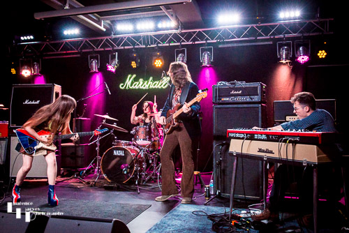 Arielle & her band on stage at Marshall Studios