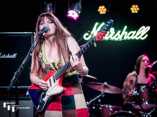 Arielle on vocals & guitar