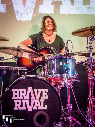 Donna Peters on acoustic guitar