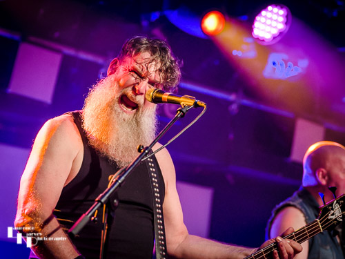 Jake 'Bakesnake' Byers on acoustic bass guitar