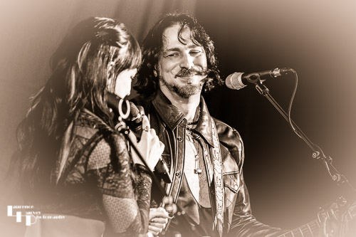 Grace Bond on vocals, Aaron Bond on guitar & vocals