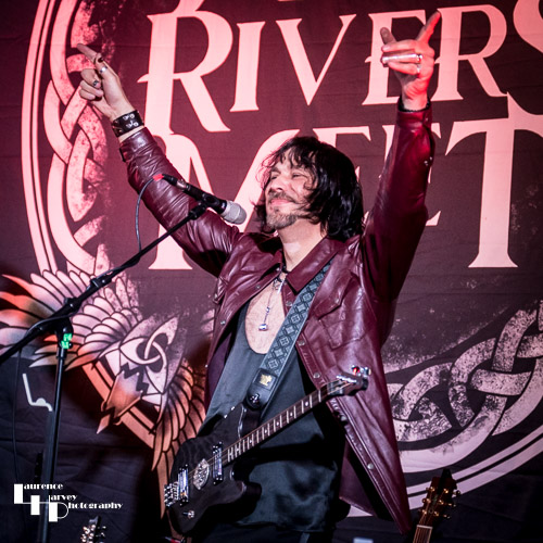 Aaron Bond on guitar